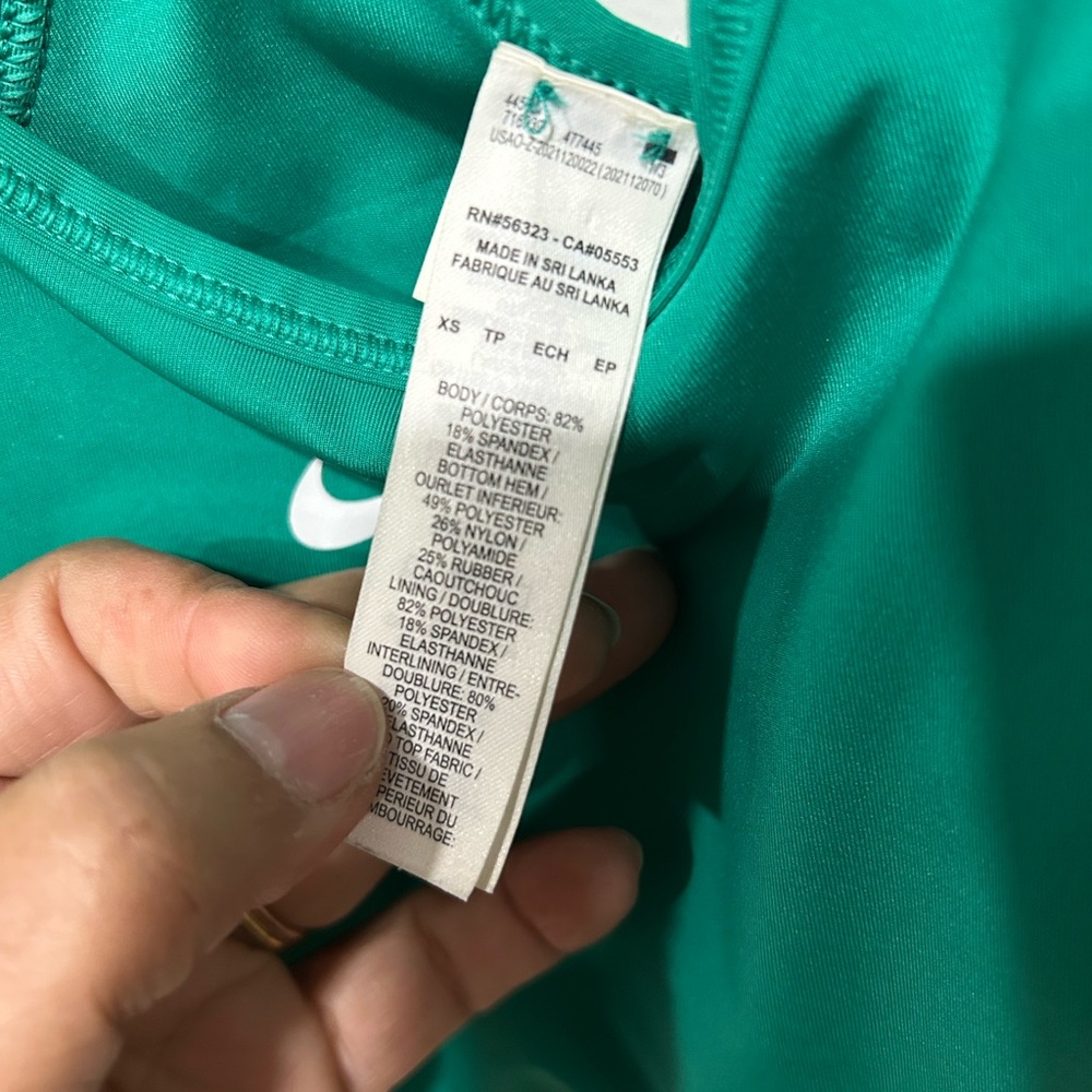 Nike Women's Emerald Green Racerback Sports Bra with White Swoosh - Picture 2 of 3